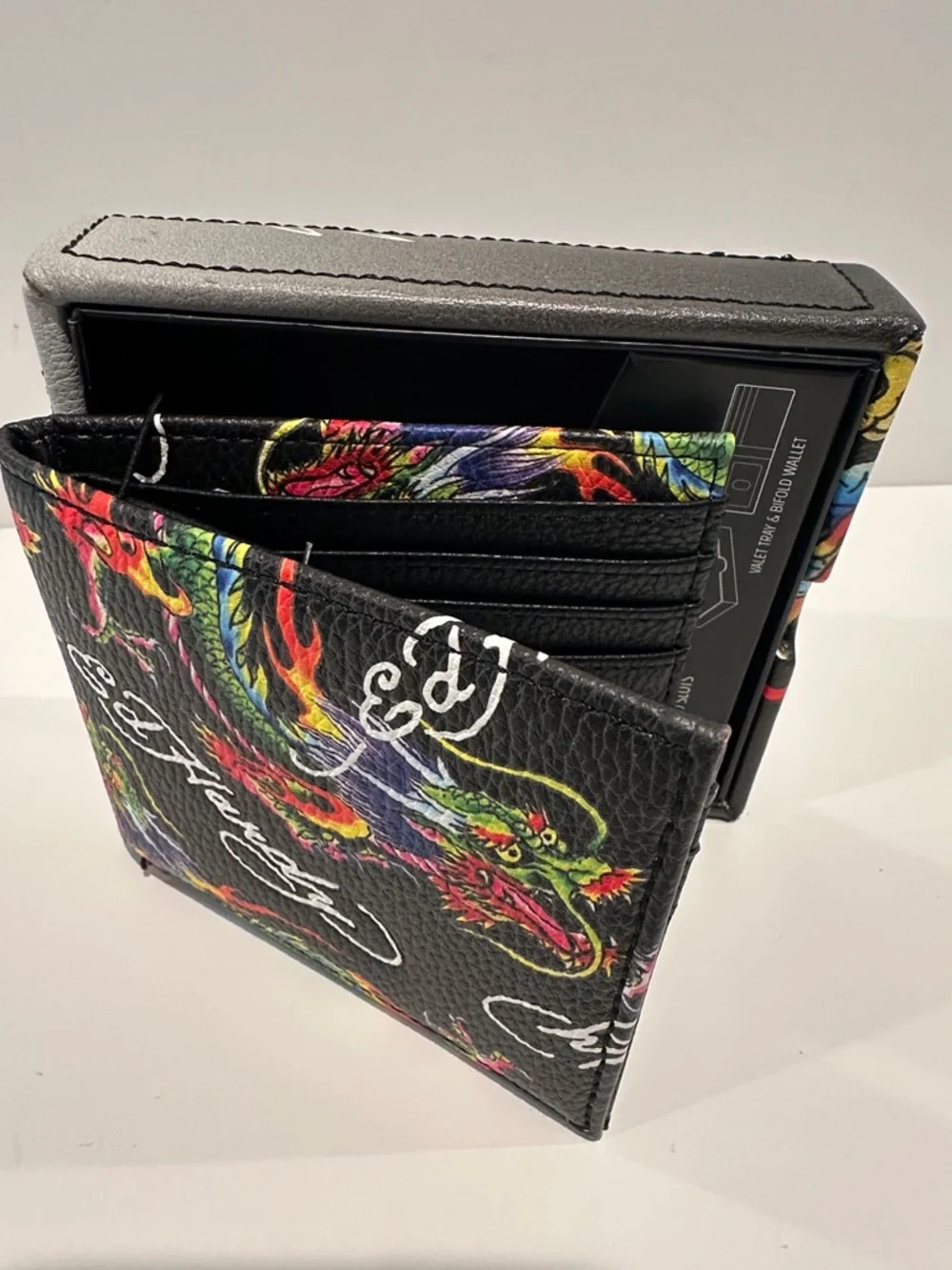 NWT Ed Hardy Men’s Bifold Wallet with Card, ID, Coin and Bill slots.